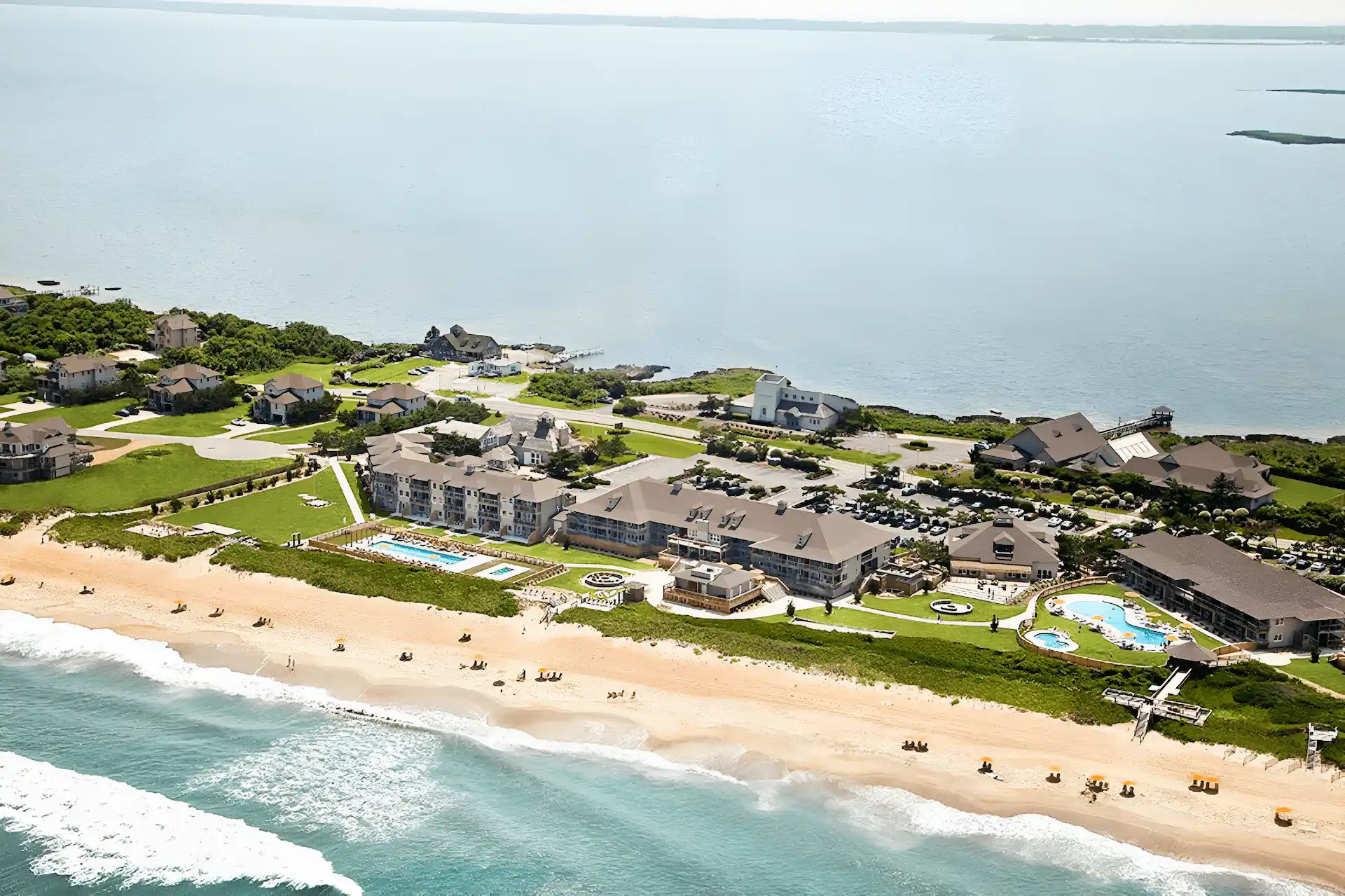 Aerial view of The North Beach (Private Beach), showcasing its pristine sands and tranquil coastal environment