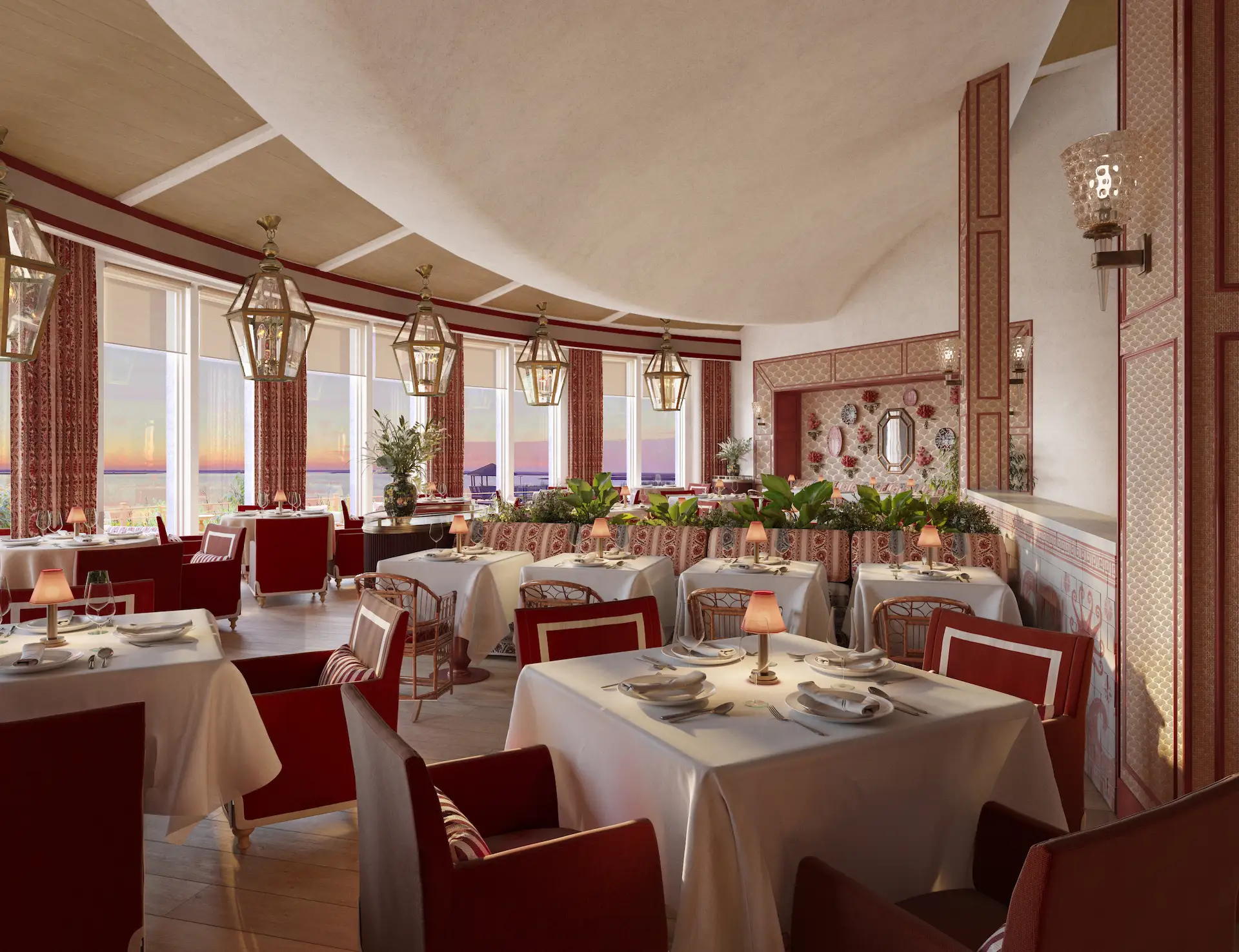 Theodosia Restaurant at Sanderling Hotel with ocean views at sunset, offering an elegant and cozy ambiance.